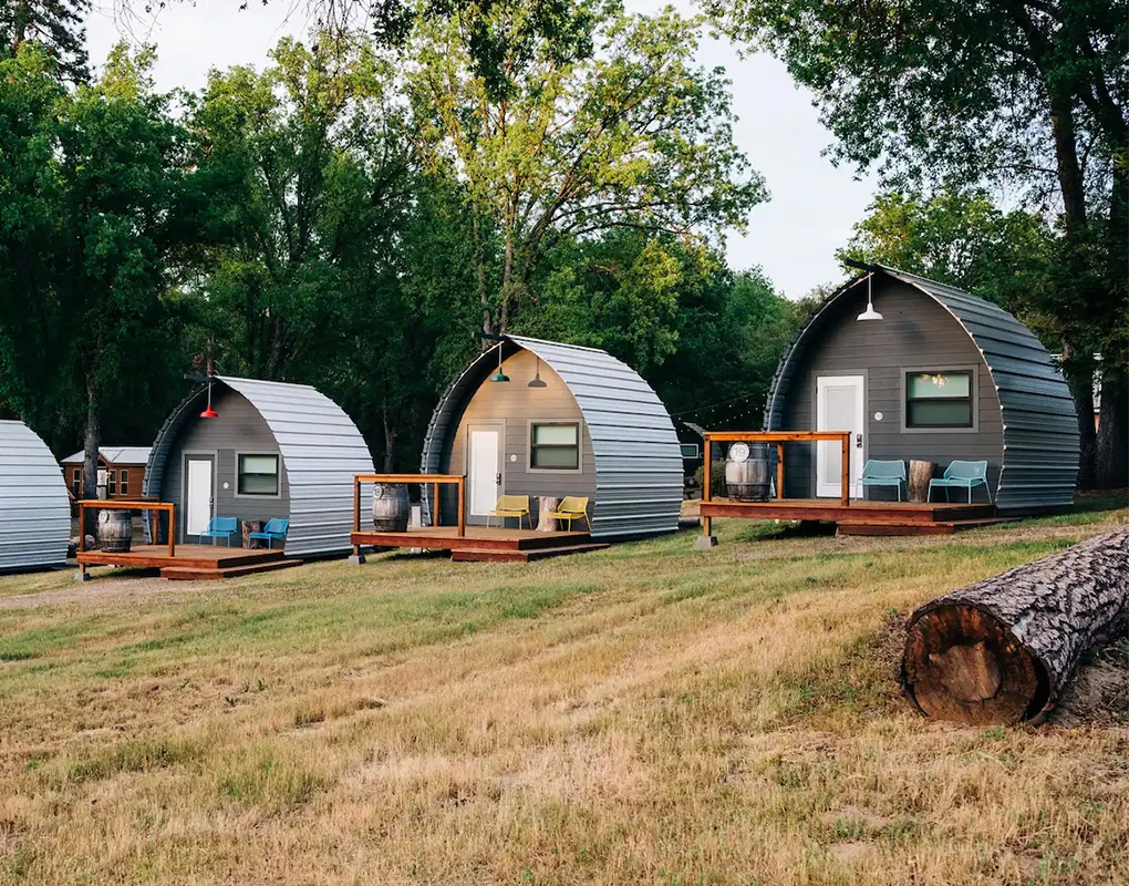 Small pointed arch cabins at a campsite near Yosemite.