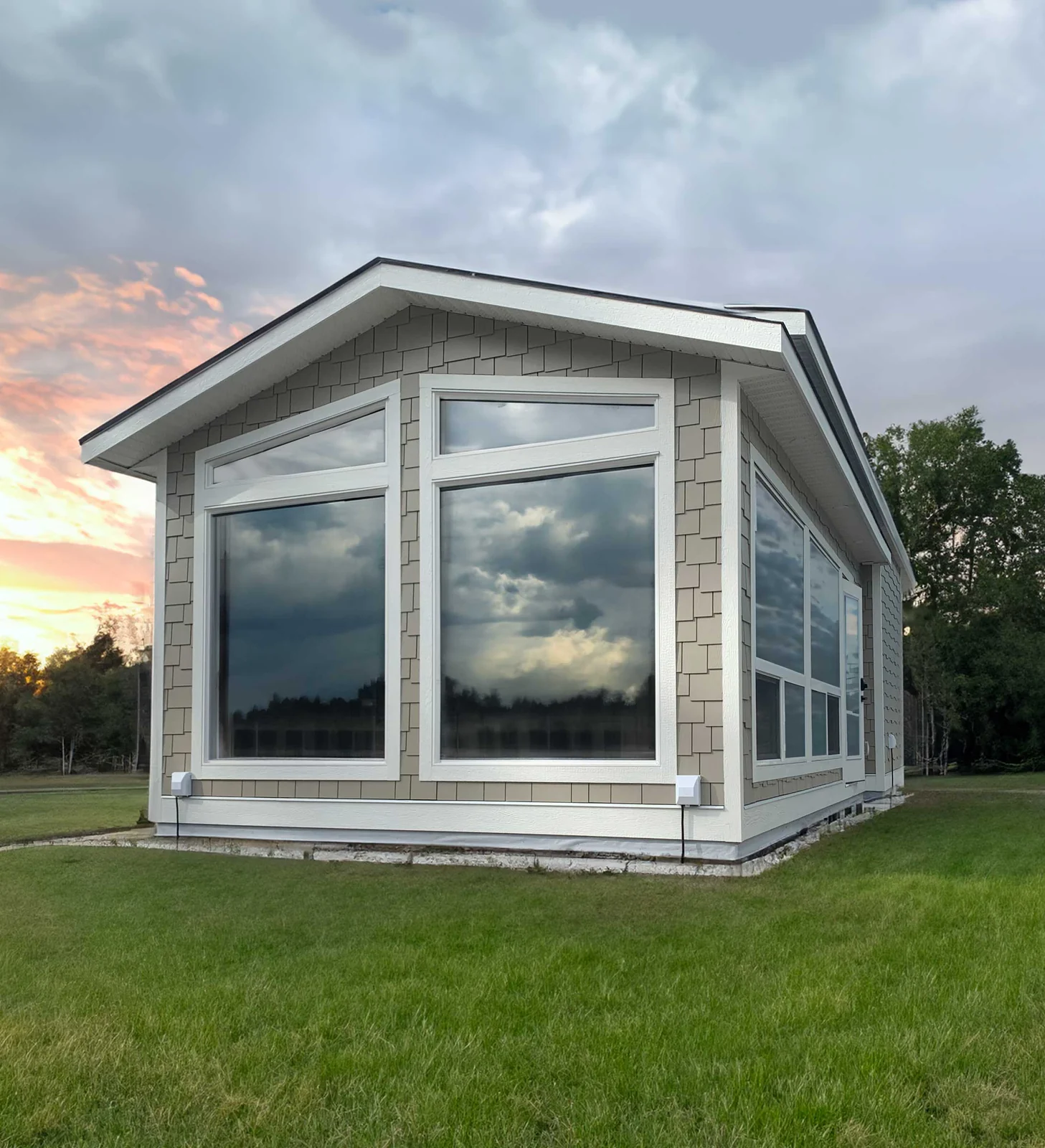Kyllo Homes factory-built park-model home exterior at sunset