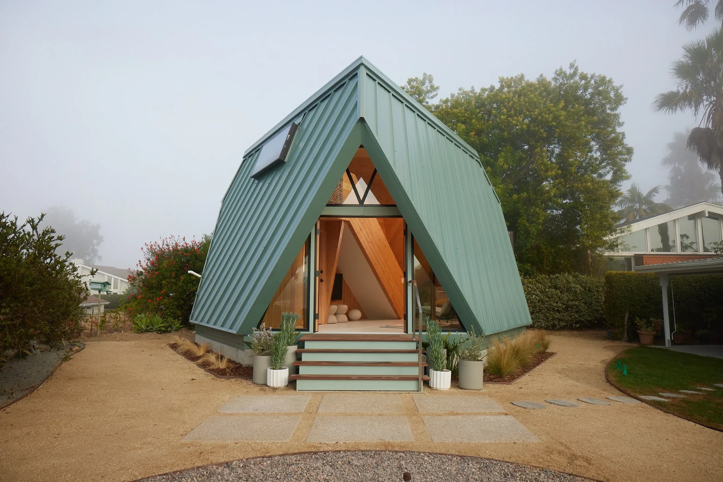 Front exterior view of the Polyhaus Tetra-1 compact geometric mass-timber home